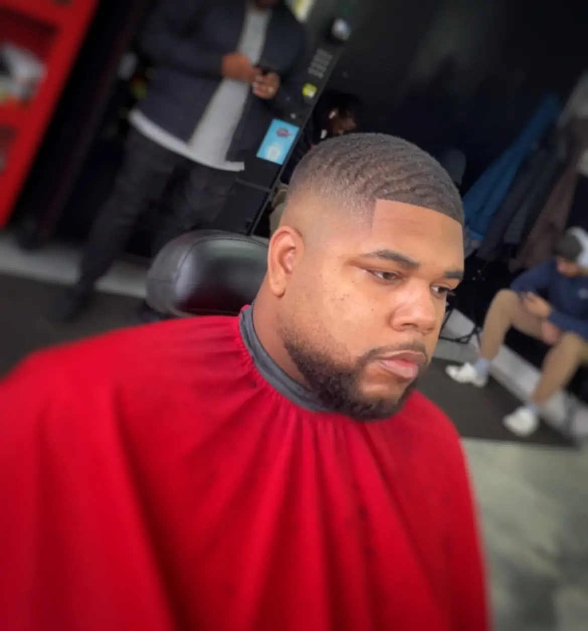 Wave haircut and beard grooming at Loop Barbershop